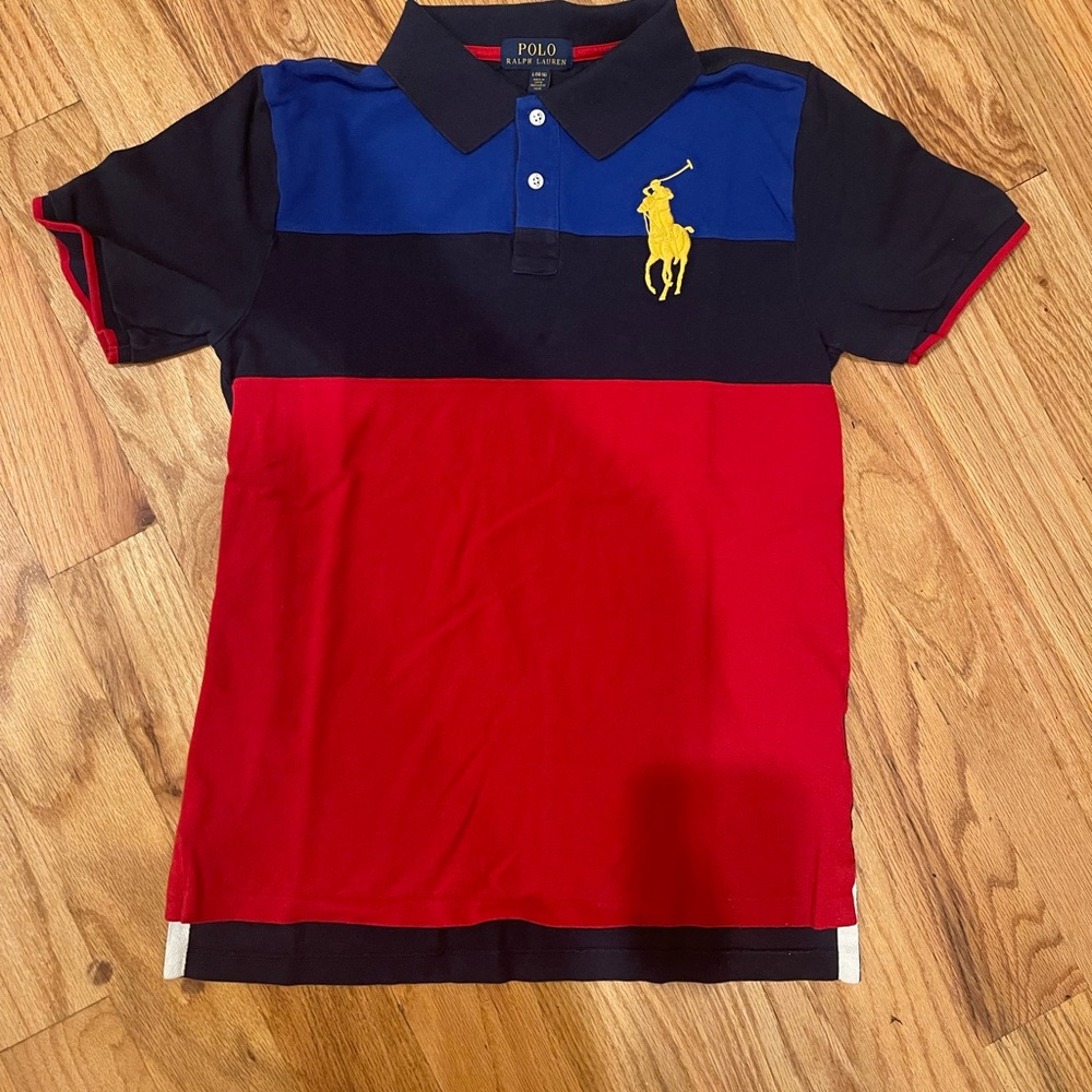 Kids size 14/16 Ralph Lauren Polo shirt. Great condition.